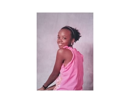 Angela during preteen years wearing a favorite top